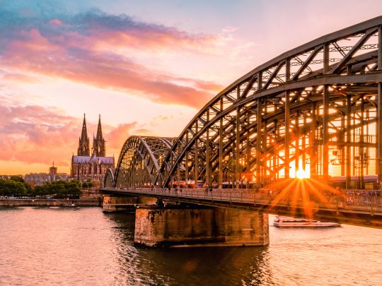 Cologne Koln Germany during sunset, Cologne bridge with cathedral Cologne Koln Germany during sunset, Cologne bridge with the cathedral. beautiful sunset at the Rhine river