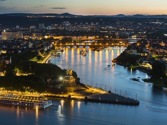 Koblenz Oldtown and Deutsches Eck At Night View of Deutsches Eck and the oldtown of Koblenz, Germany with Rhine and Moselle River in the night.